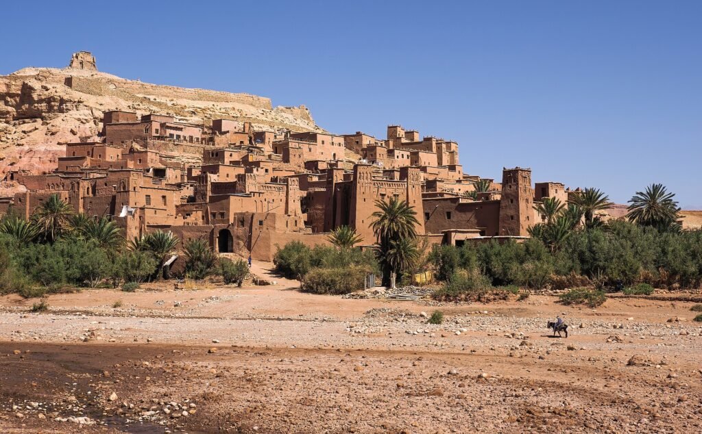 Mud-brick houses of the Ait Benhaddou ksar rising up a hillside in Morocco