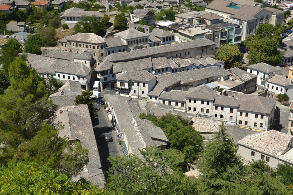 Ottoman-era houses with gray stone roofs in Gjirokaster, seen from the fortress