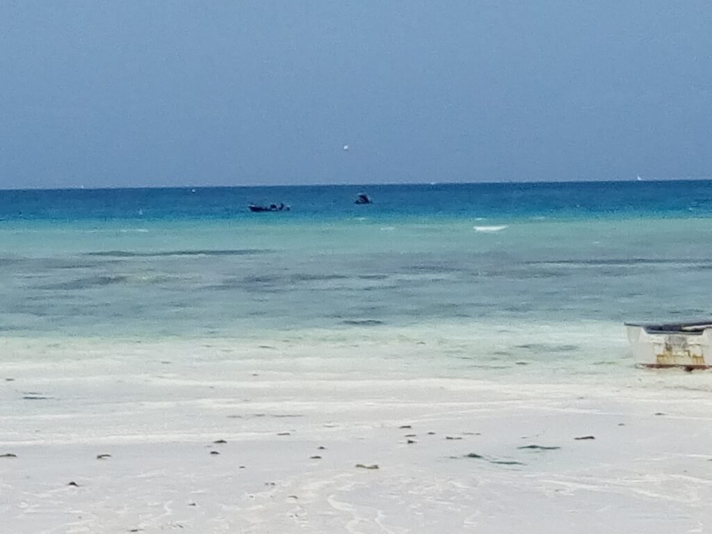 White sand and turquoise water at Nungwi beach, northern Zanzibar