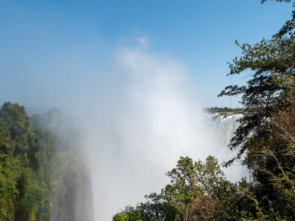 Spray rising over Victoria Falls seen from the Zambian side near Livingstone in May