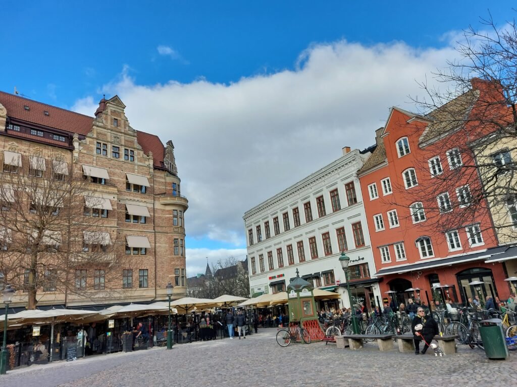 Lilla Torg square in Malmö's Old Town, with colorful facades and outdoor café seating