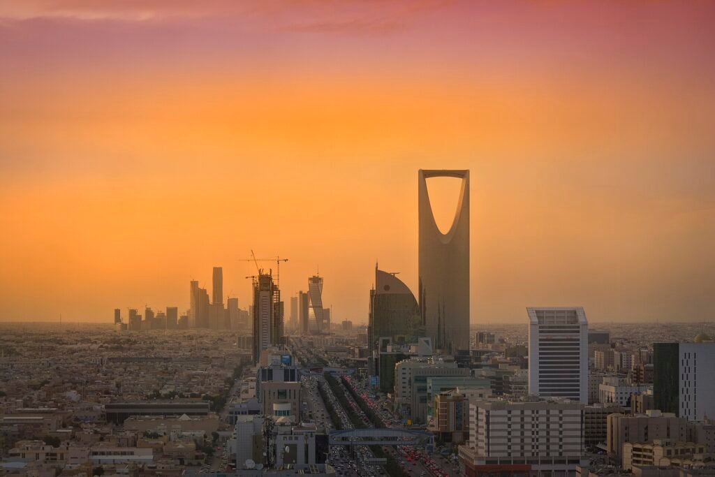 Riyadh skyline at sunset with Kingdom Tower and the KAFD financial district